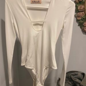 Kittenish white bodysuit
